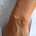 Stride of Success: Minimalist Horseshoe Bracelet