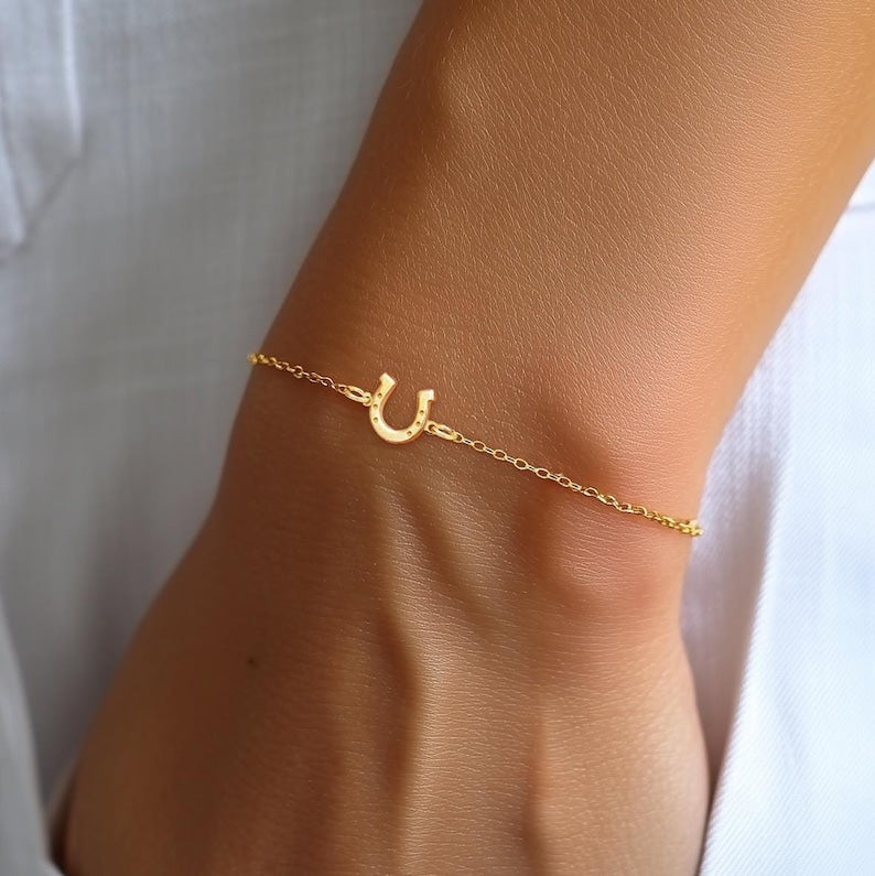 Stride of Success: Minimalist Horseshoe Bracelet